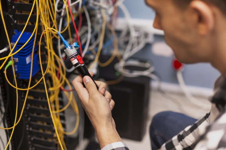 engineer man testing optical fiber scaled