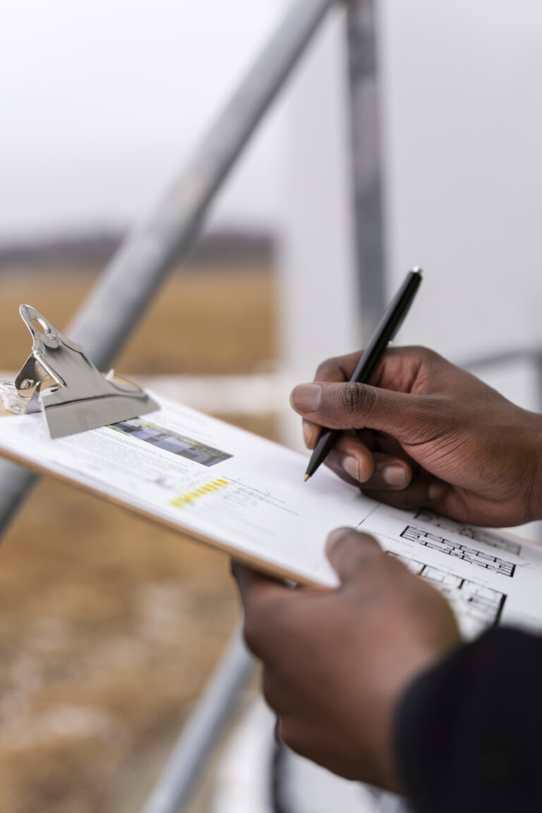 close up hand filling document scaled